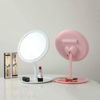 Imagen de Espejo móvil con pie 18cm, aro con luz, 28 led, recargable con cable USB, 3 colores, en caja
