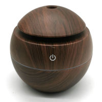 Imagen de Humidificador con luz 7 led, cambia de color símil madera, funciona con cable USB, 2 colores, en caja
