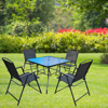 Imagen de Mesa de metal color negro tapa de vidrio, con 4 sillas de metal y textiline