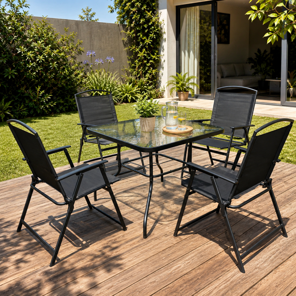 Imagen de Mesa de metal color negro tapa de vidrio, con 4 sillas de metal y textiline